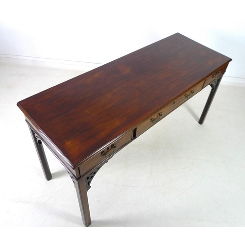 943 - A George V mahogany server, with three frieze drawers, raised on square section tapering legs and sp... 