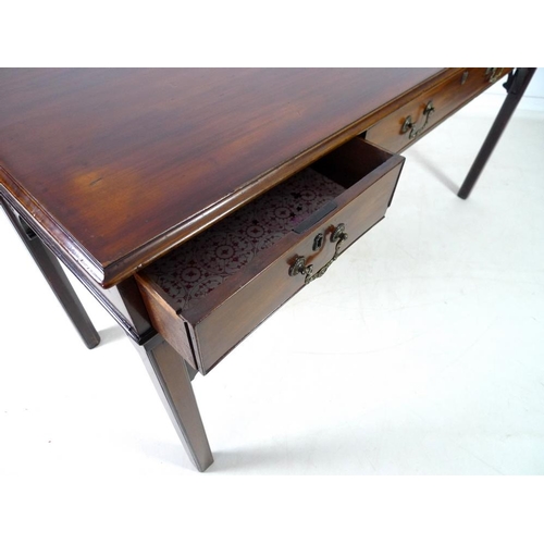 943 - A George V mahogany server, with three frieze drawers, raised on square section tapering legs and sp... 