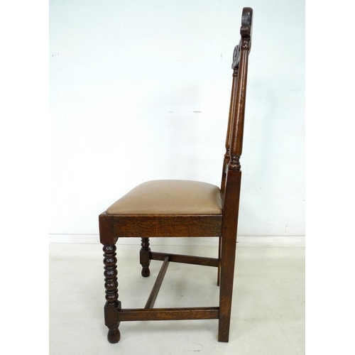 944 - A set of eight Jacobean style dining chairs, including two carvers with low backs, each with top rai... 