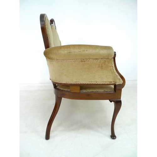 945 - An Edwardian parlour part suite of chairs, marquetry inlaid with floral crests, comprising an open a... 