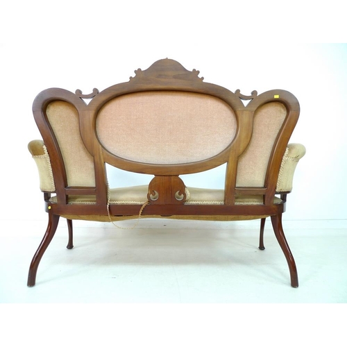 945 - An Edwardian parlour part suite of chairs, marquetry inlaid with floral crests, comprising an open a... 