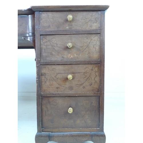 947 - A 19th century mahogany kneehole desk, nine drawers with brass pull handles, dark red leather skiver... 