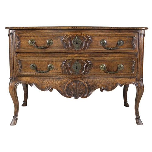 949 - A French Louis XV walnut commode of arc en arbalet outline, mid 18th century, moulded surface over t... 