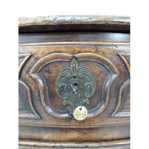 949 - A French Louis XV walnut commode of arc en arbalet outline, mid 18th century, moulded surface over t... 