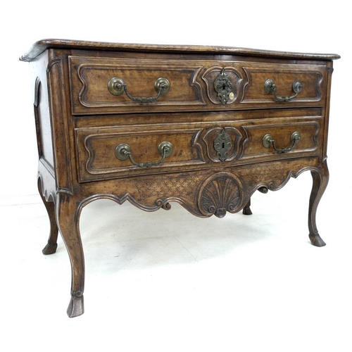 949 - A French Louis XV walnut commode of arc en arbalet outline, mid 18th century, moulded surface over t... 