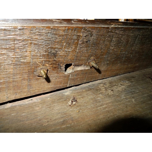 950 - An 18th century oak dresser with plate rack, the moulded cornice with iron cup hooks, the base with ... 