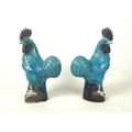 A pair of modern Chinese turquoise glazed ceramic figurines, modelled as cockerels, 28cm. (2)