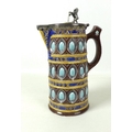 A late Victorian majolica motto jug, 'What Tho My Oates Be Poor Take Them in Good Part', tapering re... 