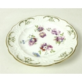 A Swansea porcelain moulded plate, circa 1815, painted with four sprays of roses, tulips and cornflo... 