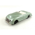 A tin plate Harold Flory Products, battery operated 'Self-Steering Electric Car', a model roadster c... 