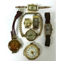 A group of seven lady's wristwatches, some lacking straps, comprising a MuDu 18K gold cased wristwat... 