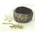 A 15ct gold brooch modelled as two swallows in flight, each set with seed pearls, marked 15ct, 4.6g,... 