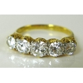 An 18ct gold five stone diamond ring, approx 1.2ct total diamond weight, central stone approximately... 