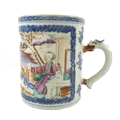 An early 19th century Chinese exportware tankard with dragon handle, painted with sages bringing gif... 
