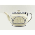 An early 19th century white stoneware teapot, moulded in relief with opposing panels of classical fi... 