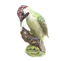 A collection of six ceramic figures comprising three Beswick models, pheasant, model no. 1225, kooka... 