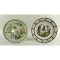 A French 18th century Nevers tin-glazed faience plate decorated with a Dutchman smoking a pipe and a... 