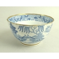 A group of ceramics, comprising an 18th century twisted and fluted tea bowl with gilt highlights, 8.... 