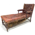 A Victorian mahogany framed day bed, with padded open arms, the squared back with small wings reclin... 
