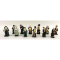 A group of twelve Royal Doulton figurines, modelled as Charles Dickens' characters, comprising Sam W... 