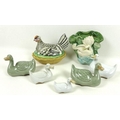 A paddling of Chinese ducks, two celadon glazed, others off-white, unmarked to bases, together with ... 