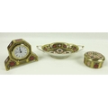 A collection of Royal Crown Derby bone china Old Imari items, comprising a solid gold band desk cloc... 