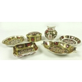 A collection of Royal Crown Derby bone china items, comprising a lidded oval box, Old Imari pattern,... 