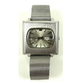 A retro Seiko '5' automatic stainless steel cased gents wristwatch with squared silvered dial and ca... 