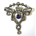 An Edwardian cornflower sapphire and diamond brooch, the stones mounted in silver and gold in the fo... 