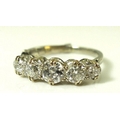 A diamond and platinum five stone ring, the graduated stones approximately 1ct total weight, size J ... 