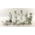 A collection of Lladro and Nao figures comprising, Lladro 'Gone Fishing, no. 4809, Lladro 'Girl with... 
