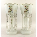 A pair of Victorian vaseline glass lustres, each decorated with colourful birds, floral sprays and g... 