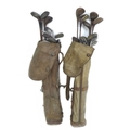A selection of early 20th century golf clubs, several hickory shafted, comprising 11 woods, 12 irons... 