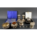A large collection of Victorian and later silver including a pair of silver dwarf candle sticks, the... 