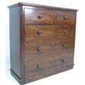 A Victorian mahogany and walnut veneered, pine cased chest of two short over three graduating drawer... 