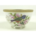 A Royal Worcester porcelain bowl, circa 1880, decorated with colourful birds amongst flowers and lea... 