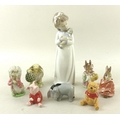 A collection of ceramic figurines, including Nao model of Girl with Doll, 25cm, Beswick Beatrix Pott... 