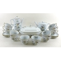 A Spode twelve person tea set, Queen's Bird pattern, comprising 12 cups, 12 saucers, tea pot, coffee... 