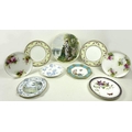 A group of decorative Royal Worcester plates, comprising a cabinet plate decorated with a butterfly ... 