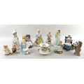 A group of nine Royal Doulton figurines, modelled as Alice, HN2158, And So To Bed, Childhood Days, H... 
