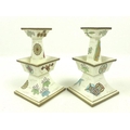 A pair of Royal Worcester porcelain candlesticks, circa 1874, in the Japanese taste, of stepped tape... 
