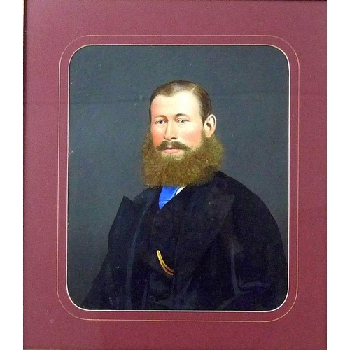 A portrait of an Edwardian gentleman with bushy beard wearing a