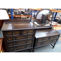 A mid 20th century oak chest of two over three drawers, together with matching dressing chest with o... 