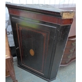 A Victorian corner cabinet, the door inset with shell marquetry.