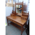 A Victorian mahogany dressing table, with rectangular mirror, two frieze drawers with brass handles,... 