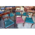 A set of four Regency style dining chairs, with bar backs and green velour drop in seats, together w... 