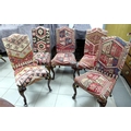 A set of five early 20th century dining chairs with kilim upholstered seats and backs, mahogany legs... 