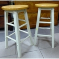 A pair of modern kitchen stools, with natural wooden tops and grey painted legs. (2)