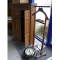 A 19th century corner cupboard with canted corners, and three panelled doors, together with a gentle... 