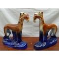 A pair of 20th century flatback, Staffordshire greyhounds
